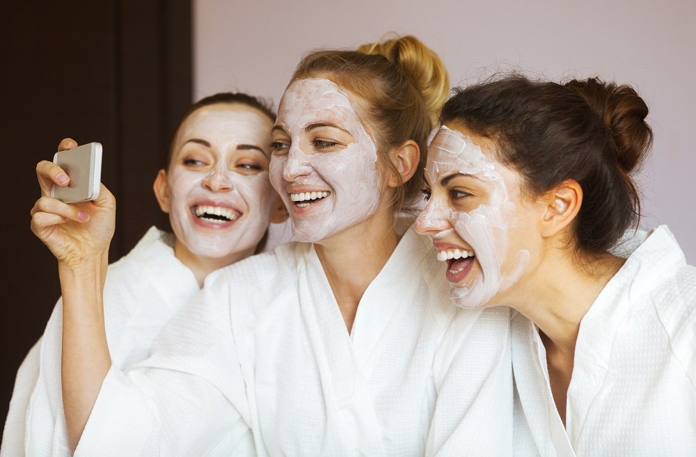 friends having a face masks on