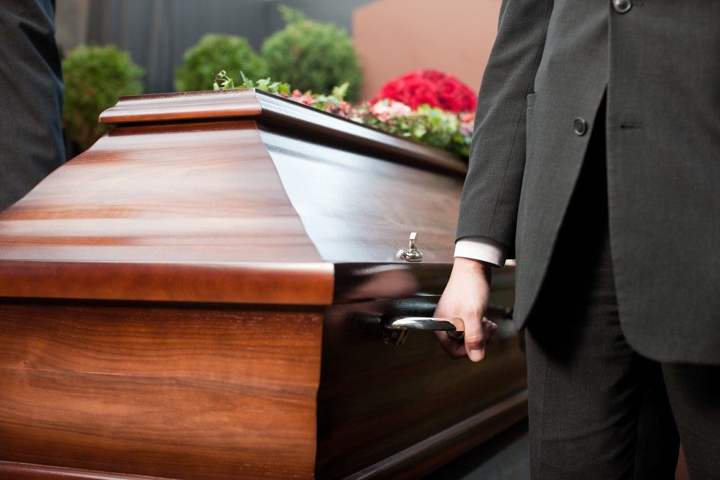 Men carrying casket